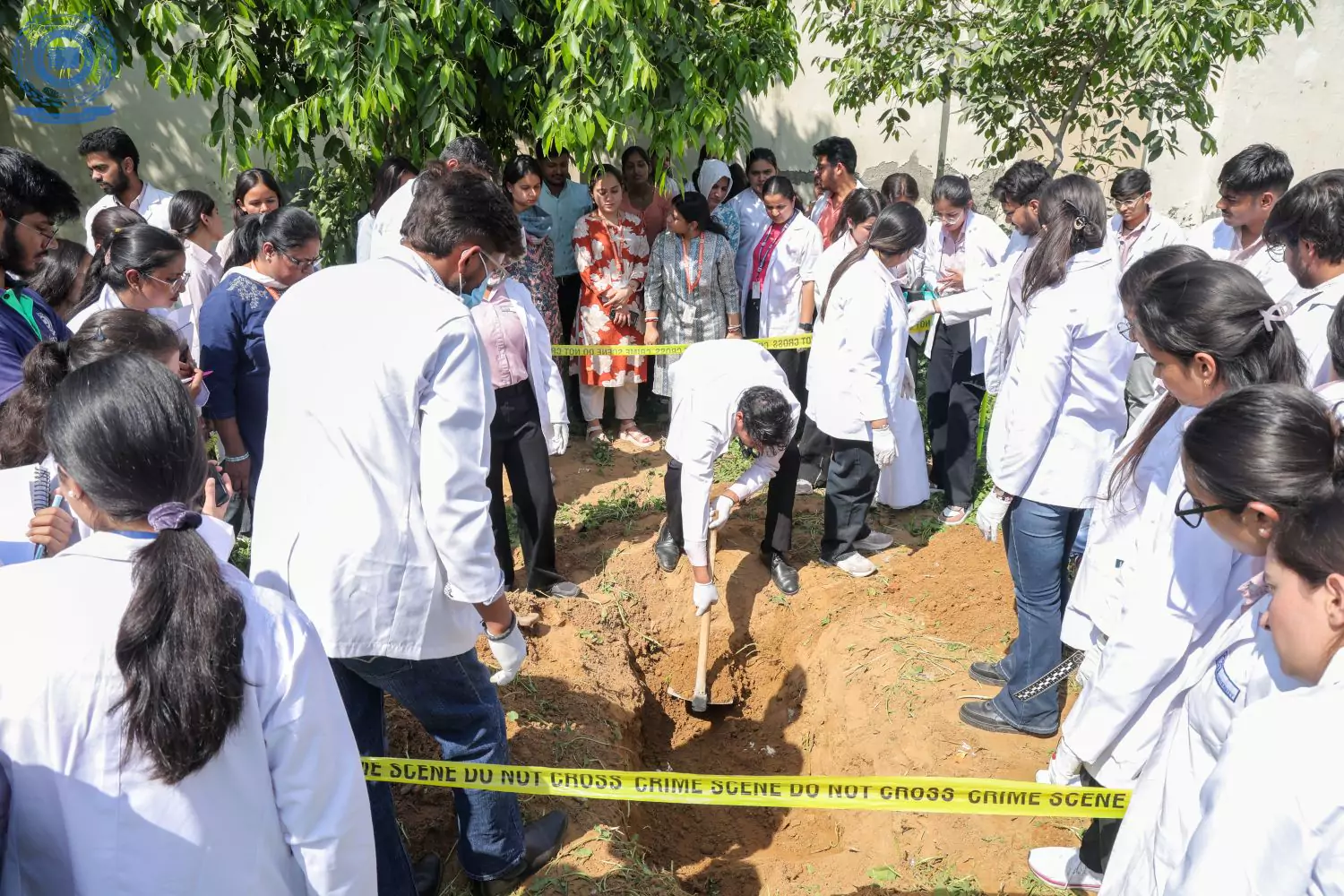 Forensic Science students engaging in practical training on exhumation techniques — bridging theory with real-world application.